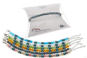 Bracciale acciaio con sfere vetro 6 mm. e rondelle in pietra