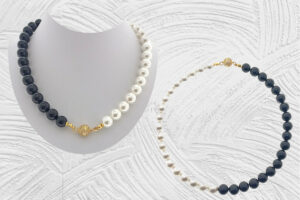 Collana bicolore con perle e pietre onice mm. 10 chiusura calamita sfera strass dorata