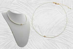 Collana perle mm. 4 con sfera zirconi dorata e chiusura acciaio