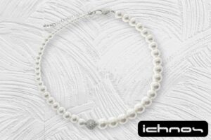 Collana perle assimetrica con sfera zirconi chiusura acciaio