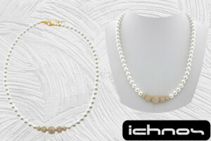 Collana perle mm. 6 con centrale 5 sfere zirconi dorate chiusura acciaio
