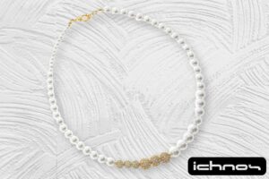 Collana perle assimetrica con 6 sfere zircone degrad? dorate chiusura acciaio