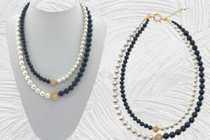 Collana 2 fili bicolore con perle e pietre onice, sfere zirconi e chiusura acciaio dorate