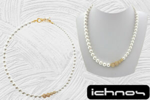 Collana perle assimetrica con 4 sfere zircone degrad? dorate chiusura acciaio