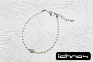 Bracciale perle mm. 4 con chiusura acciaio, pallina strass e catenina di regolazione