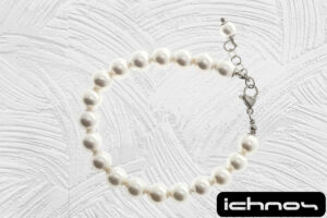 Bracciale perle mm. 8 con chiusura acciaio e catenina di regolazione