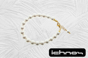 Bracciale perle mm. 8 con chiusura acciaio dorata e catenina di regolazione