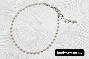 Bracciale perle mm. 4 con chiusura acciaio e catenina di regolazione