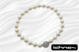 Bracciale perle mm. 6 elasticizzato con sfera strass