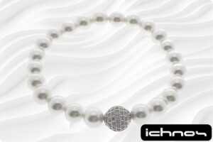 Bracciale perle mm. 8 elasticizzato con sfera strass