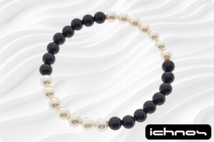 Bracciale bicolore perle e onice mm. 6 elasticizzato 4 segmenti