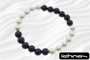 Bracciale bicolore perle e onice mm. 8 elasticizzato 4 segmenti