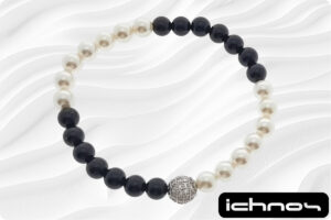 Bracciale bicolore perle e onice mm. 6 elasticizzato 4 segmenti con sfera strass