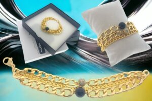 Bracciale 3 maglie alluminio dorato con perla onice e sfera strass